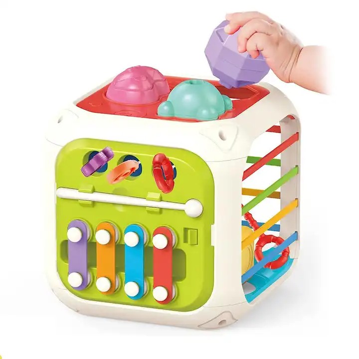 Fidtoy Cube d'activités Montessori 7-en-1 pour tout-petits – Cube d'apprentissage sensoriel multifonctionnel avec trieur de formes, xylophone, engrenages, perles, ficelle à tirer et blocs empilables
