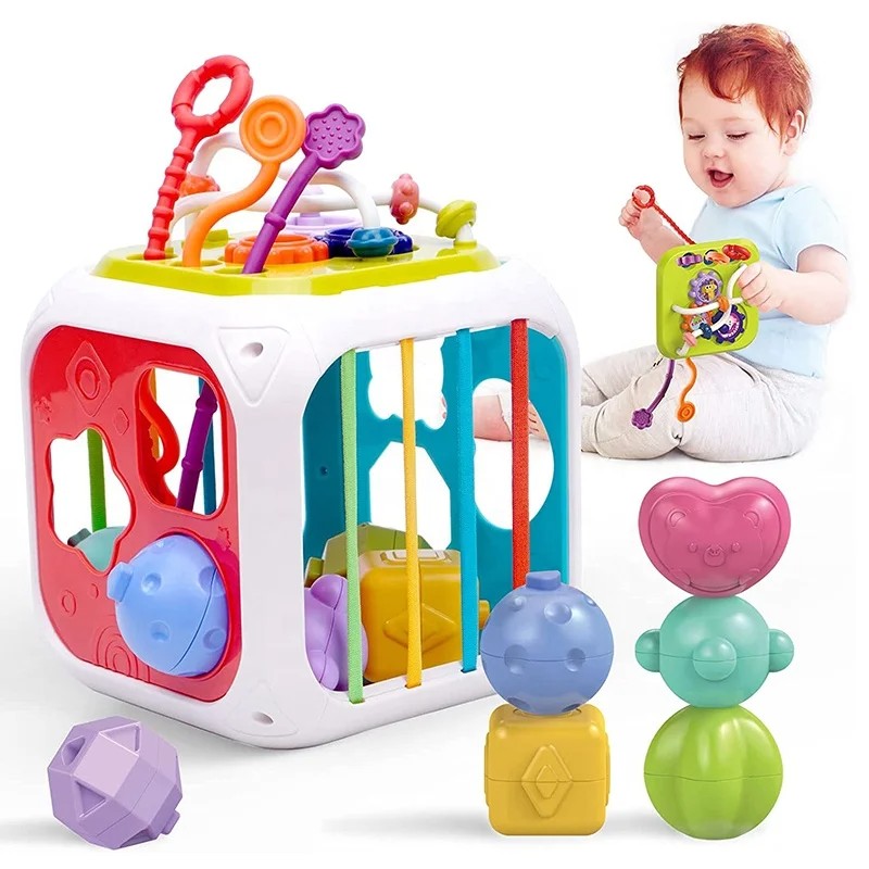 Fidtoy Cube d'activités Montessori 7-en-1 pour tout-petits – Cube d'apprentissage sensoriel multifonctionnel avec trieur de formes, xylophone, engrenages, perles, ficelle à tirer et blocs empilables