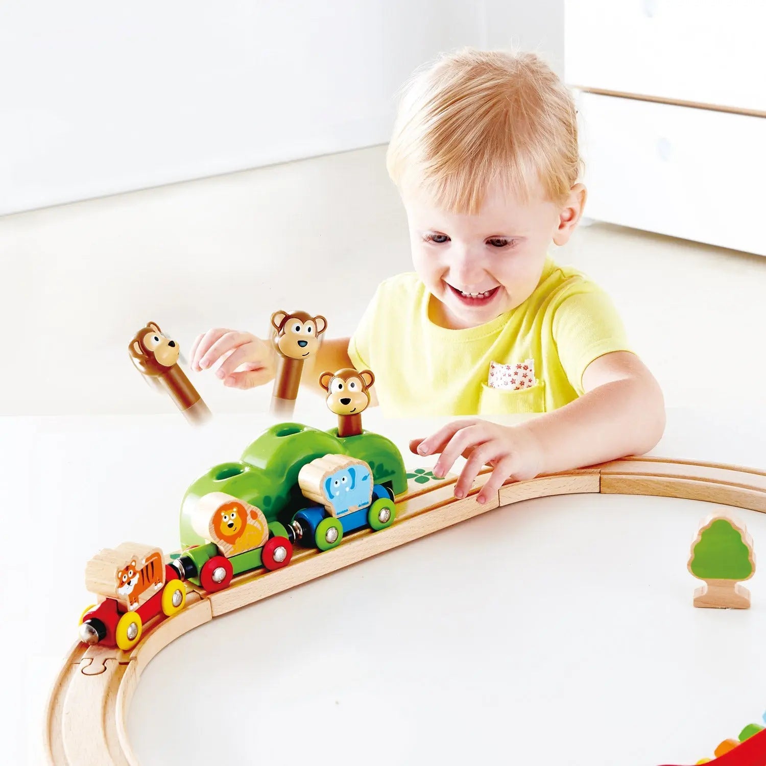 Juego de tren de madera Fidtoy Jungle con pista de música para niños pequeños
