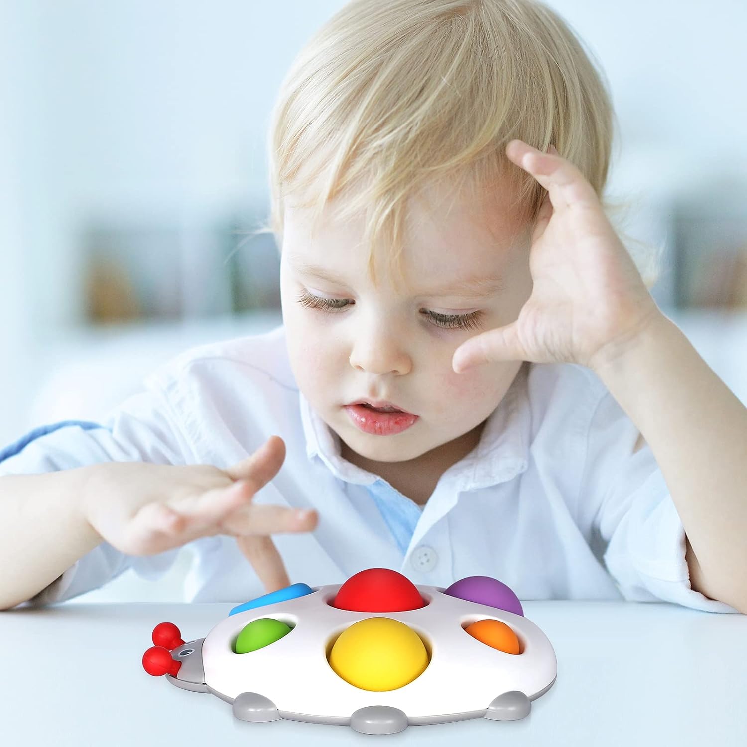Fidtoy Jouet Pop sensoriel en silicone pour bébé à partir de 6 mois, planche à bulles tactile, jouet de voyage et de bain apaisant, jouet pour la motricité fine