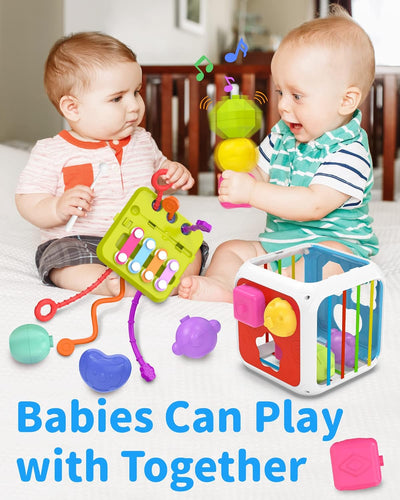 Fidtoy Cube d'activités Montessori 7-en-1 pour tout-petits – Cube d'apprentissage sensoriel multifonctionnel avec trieur de formes, xylophone, engrenages, perles, ficelle à tirer et blocs empilables