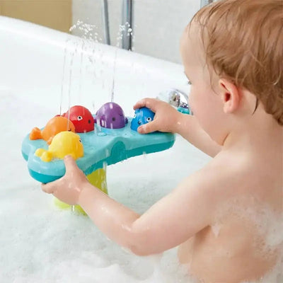 Juguete de baño con fuente de ballena musical Fidtoy para que los niños pequeños jueguen con agua